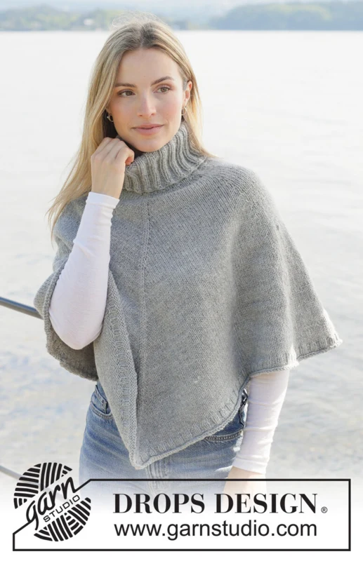 271-28 Hazy Sky Poncho by DROPS Design — 3